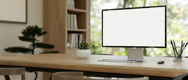 A computer desk workspace in a modern private office, a white-screen PC computer mockup on a wooden table. 3d render, 3d illustration