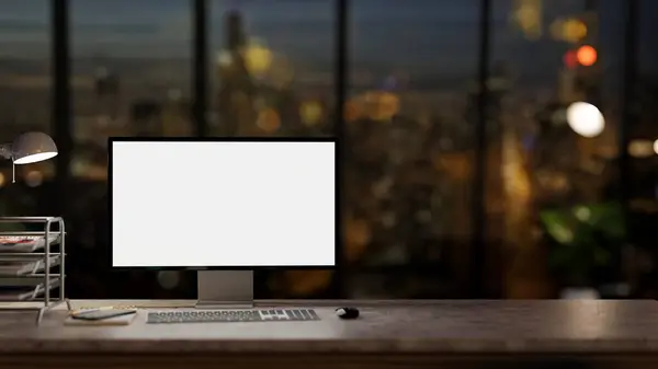A computer desk in a modern dark office at night with a city view through the large glass window. a computer white-screen mockup. 3d render, 3d illustration