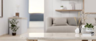 Çağdaş gri oturma odasındaki mermer kahve masasında ürünleri sergilemek için bir sunum alanı. 3d görüntüleme, 3d illüstrasyon