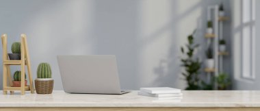 Dizüstü bilgisayarın, kitapların ve minimalist bir odadaki masada duran kaktüsün arka plan görüntüsü. İş yeri konsepti. 3d görüntüleme, 3d illüstrasyon