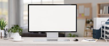 Modern bir özel ofiste ya da merkez ofisteki bir masada beyaz ekran maketi ve ofis malzemesi olan bir bilgisayar. yakın plan resim, 3d görüntüleme, 3d illüstrasyon