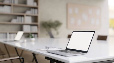 Çağdaş bir toplantı odasında ya da çalışma alanında toplantı masasında beyaz ekran maketi olan bir dizüstü bilgisayar. iş yeri konsepti, 3D render, 3D illüstrasyon