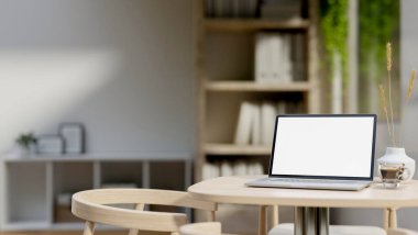 Minimalist bir odada tahta bir masanın üzerinde beyaz ekran maketi olan bir dizüstü bilgisayar. iş yeri, ev çalışma alanı, 3D çizim, 3D illüstrasyon