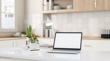 Minimalist beyaz bir mutfaktaki beyaz mutfak adasında beyaz ekran maketi ve aksesuarları olan bir dizüstü bilgisayar. ev işyeri konsepti. 3d görüntüleme, 3d illüstrasyon