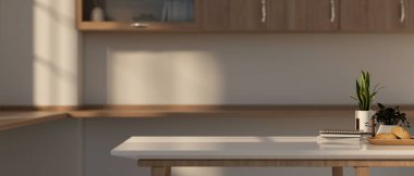 Modern, minimalist bir mutfaktaki beyaz mutfak masasında ürünleri sergilemek için bir kopya alanı. 3d görüntüleme, 3d illüstrasyon