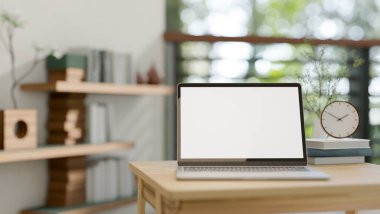 Evdeki bir odada, ahşap bir masanın üzerinde beyaz ekran maketi olan bir dizüstü bilgisayarın yakın çekim görüntüsü. ev çalışma alanı, iş yeri, 3D çizim, 3D illüstrasyon