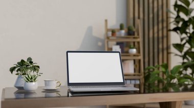 Beyaz ekranlı bir dizüstü bilgisayar, bir kahve fincanı, minimalist bir odada kahve masasında dekoratif bitkiler. 3d görüntüleme, 3d illüstrasyon