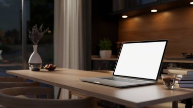 Modern, lüks bir mutfakta, ahşap bir yemek masasında beyaz ekran modeli olan bir dizüstü bilgisayarın yakın çekimi. ev çalışma alanı, iş yeri, 3D çizim, 3D illüstrasyon