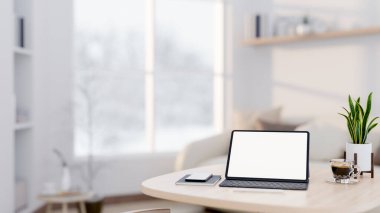 Parlak bir minimalist odadaki ahşap bir masanın üzerinde beyaz ekran maketi ve dekoru olan dijital tabletin yakın çekimi. Çalışma alanı. 3d görüntüleme, 3d illüstrasyon