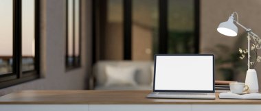 Ahşap masada beyaz ekran bir dizüstü bilgisayar ve oturma odasında dekoratif bir eşya. Rahat atmosferi olan çalışma alanı. 3d görüntüleme, 3d illüstrasyon.