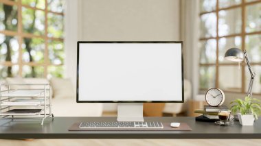 The white screen desktop on wooden table with decor, with the blurred background of garden view room. home office or living room with bright natural light. 3D render, 3D Illustration.