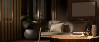 Odanın ortasında dekoratif eşyalarla dolu yuvarlak ahşap masa, karanlık oturma odasının bulanık arka planı. Gece vakti oturma odası ya da ev ofisi. 3B görüntüleme, 3B Görüntü.