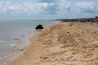 Dhanushkodi, Tamil Nadu, India - Oct 10, 2024: Dhanushkodi Beach, located near Arichal Munai, is known for its pristine sands and clear waters. Dhanushkodi is an abandoned town clipart