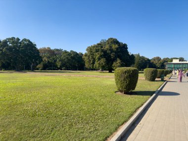 Srirangapatna, Karnataka, India - Feb 07,2025: Big garden in the complex of the Tipu Sultan's summer palace also known as Daria Daulat Bagh located in the city of Srirangapatna, near Mysore clipart