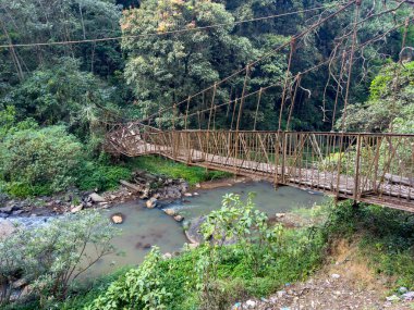 Broken hanging bridge opposite to Abbey Falls in Kodagu, in the Western Ghats of Karnataka, India.