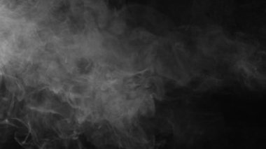 White natural steam fog smoke effect on solid black background with abstract blur motion wave swirl use for overlay in pollution, vapor cigarette, gas, dry ice, warm hot food, boil water smoke concepts