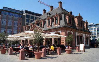 Baroque building of Hauptwache, built in 1730, former guard-house with a cafe, Frankfurt, Germany - May 8, 2022