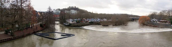 Rapids on the river Lahn, panoramic view on gloomy afternoon, downstream from the Old Lahnbridge, Wetzlar, Germany - February 4, 2023