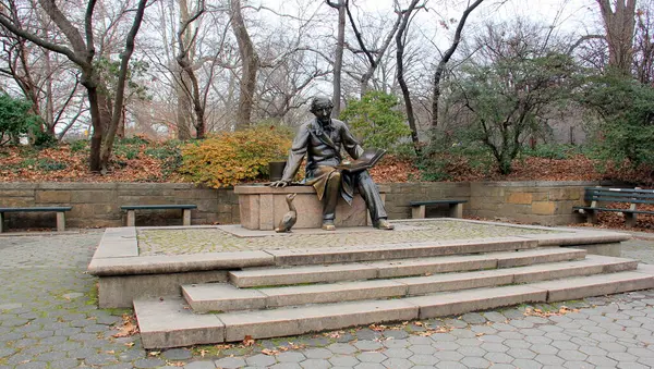 Hans Christian Andersen monument, at the western edge of Conservatory Water in Central Park, created by George Lober and installed in the park in 1956, New York, NY, USA - December 23, 2023