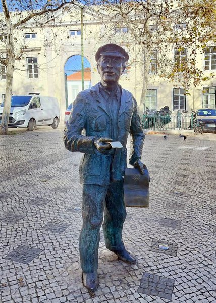 'O Cauteleiro', bronze statue of a lottery ticket seller, sculptural work by Fernando Assis, installed in 1987 at Largo Trindade Coelho in Chiado, Lisbon, Portugal - February 2, 2024