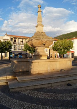 Filipino Fountain, in the Praca Francisco Antonio Meireles, restored 17th-century Mannerism-styled stone public fountain the main square of the town, Torre de Moncorvo, Portugal - May 23, 2023 clipart