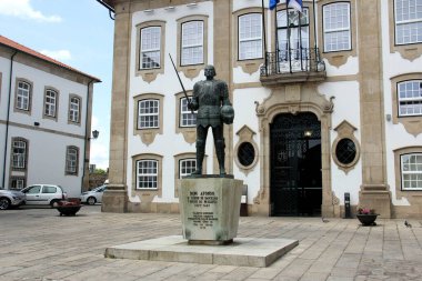 Monument to Dom Afonso, Count de Barcelos, in front of the Town Hall, in the Camoes Square, Chaves, Portugal - May 22, 2023 clipart