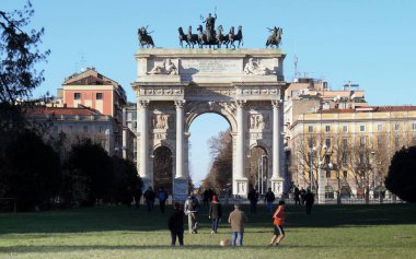 Arch of Peace at Porta Sempione, Sempione Gate, 19th century arch built in place of ancient city gates, Milan, Italy - December 26, 2014 clipart