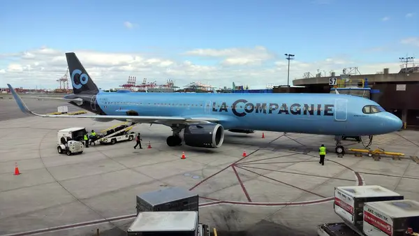 stock image La Compagnie A321neo airliner on tarmac of Newark Liberty International Airport airliner at the passenger boarding bridge, Newark, NJ, USA - May 19, 2024