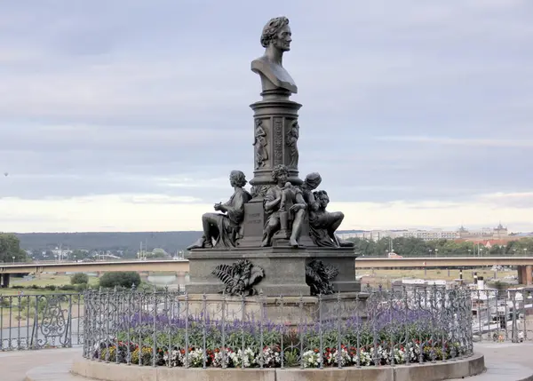 stock image Monument to Ernst Rietschel, famous 19th-century German sculptor, by Johannes Schilling, at Bruhl's Terrace overlooking River Elbe, Dresden, Germany - July 4, 2024