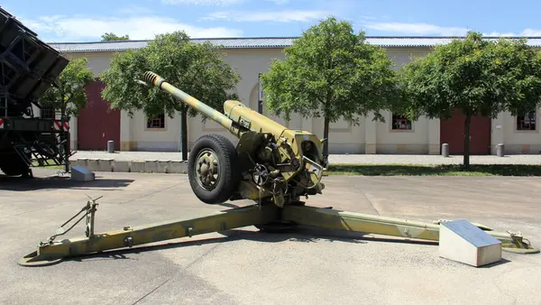 stock image Military hardware on display in the grounds of the Bundeswehr Museum of Military History, 122-mm howitzer D-30, Dresden, Germany - July 6, 2024