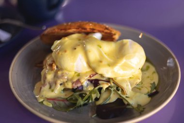 Breakfast of poached eggs and bacon