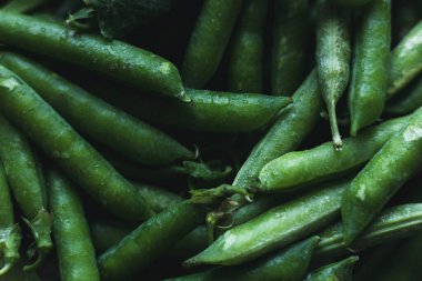 Yeşil bezelye kabuklarının arka planı
