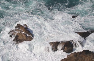 Surf poinding some offshore rocks at Point Reyes National Seashore, California