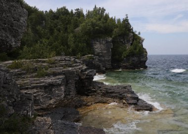 Interesting coastline near the Grotto, Bruce Peninsula National Park, Tobermory, Ontario, Canada clipart