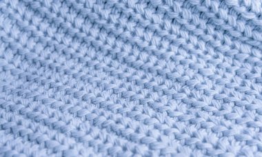 Mavi rengin desenli örülmüş arka planı. Kapat..