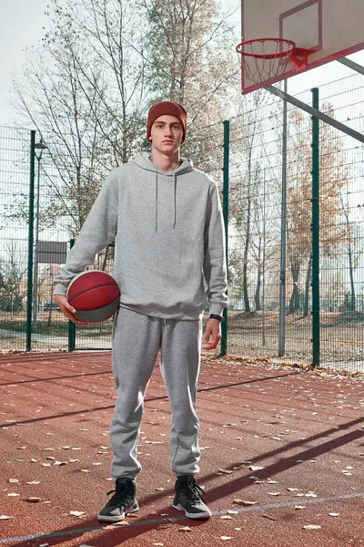 Teenager Gray Tracksuit Brown Cap Ball His Hands Full Length — Stock Photo, Image