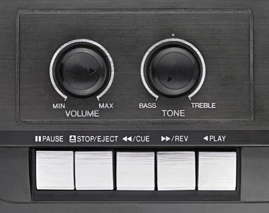 A vintage audio controls, featuring volume and tone dials with playback buttons below. Retro aesthetic highlighting analog sound systems and nostalgic technology. clipart