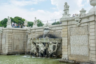 Editorial. June, 3, 2024. Vienna, Austria. A view of the fountain and the Belvedere palace complex, the landmark of the Austrian capital. clipart