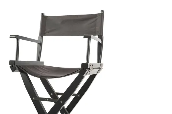 その上に黒い布が付いている黒い椅子 椅子は白い背景に座っている ロイヤリティフリーのストック写真