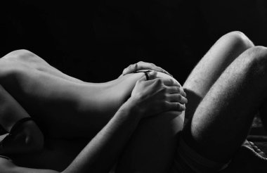 sexy sensual couple in love of naked man and woman having sex games in bed, orgasm.