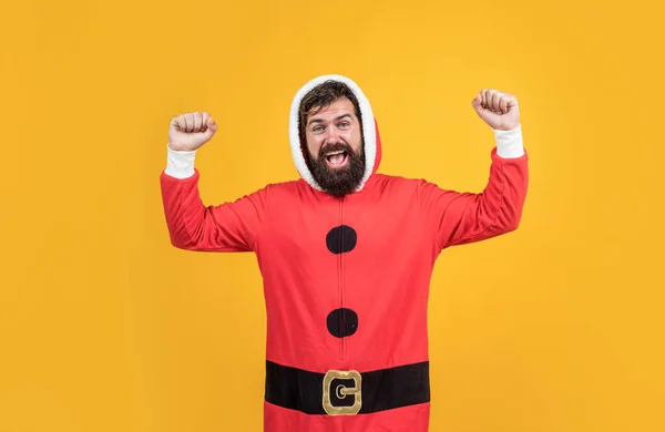 Capturing a happy moment. winter holiday preparations. present and gift shopping sale. happy new year. merry christmas. cheerful bearded man in santa costume. brutal hipster celebrate xmas party.