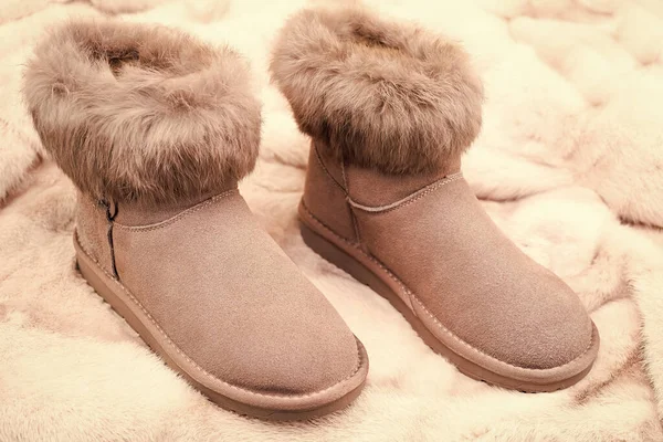 Pair Fashionable Beige Winter Ugg Boots Fur Background Fashion Accessory — Stock Photo, Image