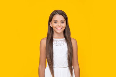 cute teen girl in white dress has long hair on yellow background. clipart