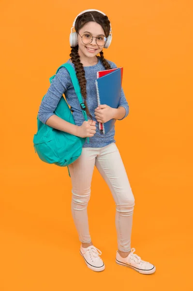 Educational reform. Goal of changing public education. Regular school day. Stylish schoolgirl. Girl little carry backpack. Schoolgirl daily life. Inspired and motivated schoolgirl. Knowledge day.