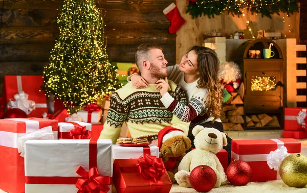 celebrating christmas. last holiday preparations. man and woman happy at xmas. holiday gifts for beloved. spend new year together. couple in love among present box. celebrate xmas party with couple.