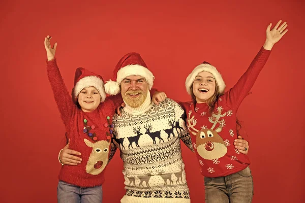 Family time. Father and little daughters celebrate new year together. Holly jolly christmas. Dad and kids having fun. Christmas becomes special with children. Christmas eve concept. Winter holidays.