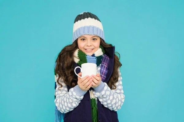best hand warmer. winter vibes. happy girl hipster. kid winter fashion. feeling good any weather. Stay active this season. kid warm knitwear. child hot tea cup. Have warming drink. ideas for warming.