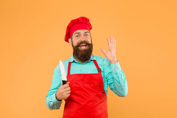 Family dinner ideas. Hipster cook hat and apron cooking delicious food.
