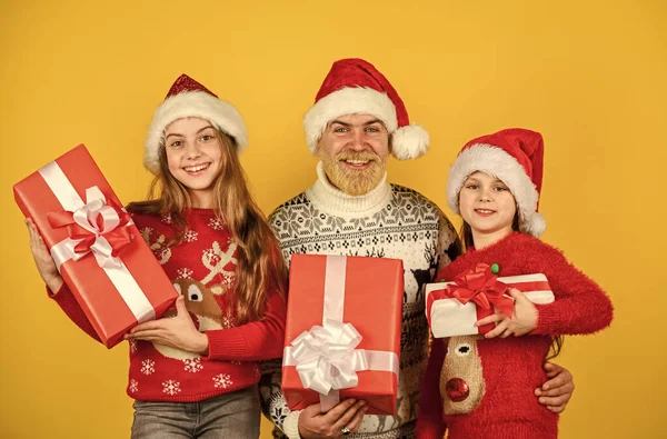 Family time. Holly jolly christmas. Surprising miracle. Dad kids having fun. Father and little daughters celebrate new year together. Christmas becomes special with children. Christmas eve concept.