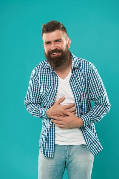 Laughing all the day. Carefree natural emotion. Caucasian man isolated on blue background laughing happy. Happy man with big smile. Handsome guy with beard happy face. Sense of humor. Stomach pain.